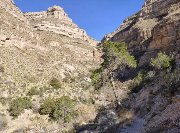 Path by edge and tall cliffs