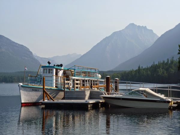 Boat on lake with mountains