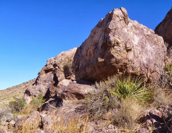 Huge boulder on hillside