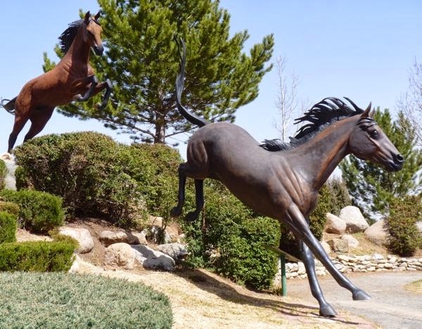 Horse sculpture running