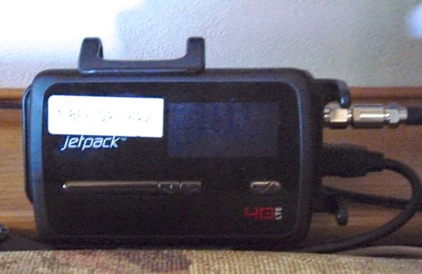 MiFi Jetpack held by booster