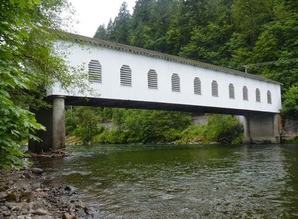 Covered bridge spanning river