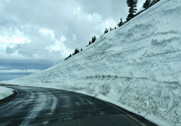 Very tall snowbank next to road
