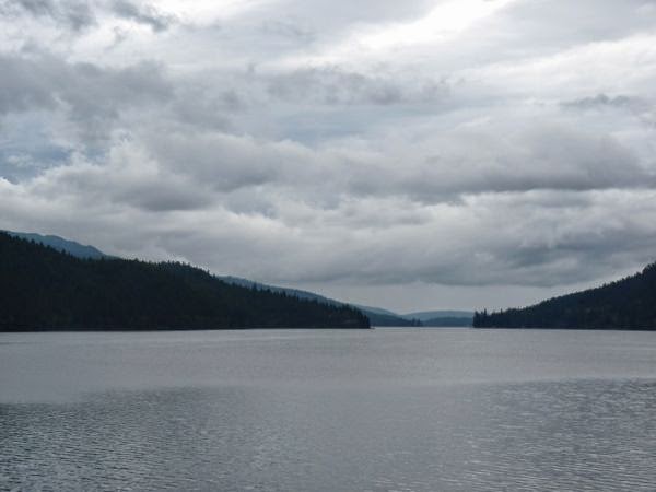Lake, mountains, cloudy sky