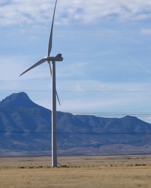 Windmill with mountains