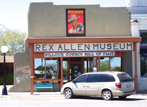 Storefront, museum, car