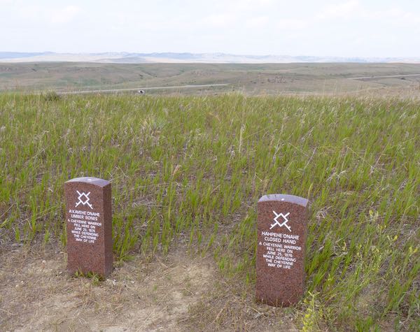 Grave markers, grass, hills