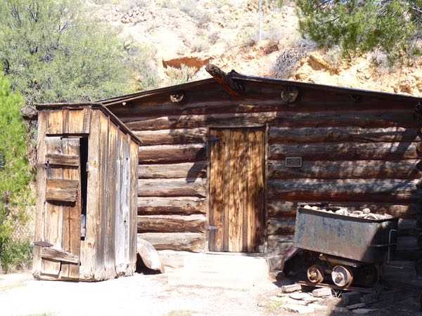 Cabin, outhouse, miner's cart